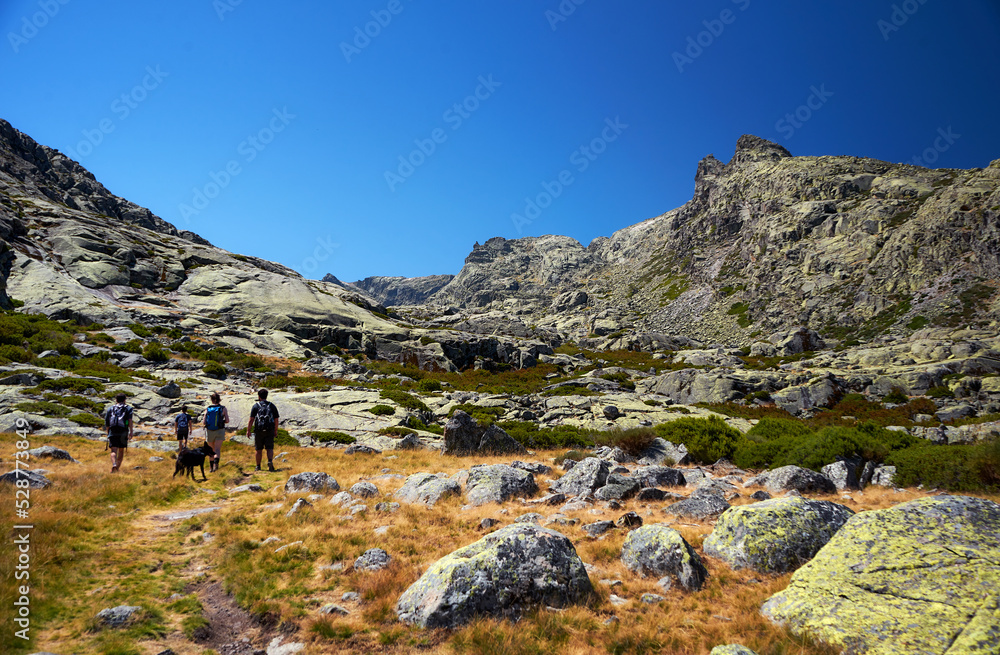 Mountain landscape with people hiking