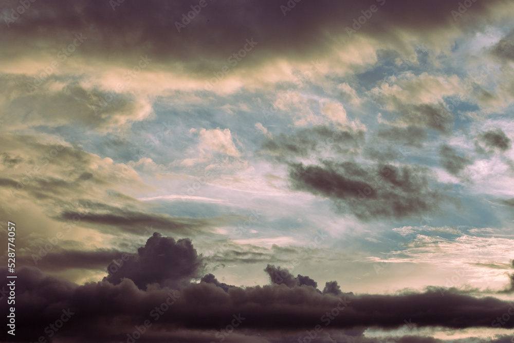 Obraz premium stormy clouds with some a blue break