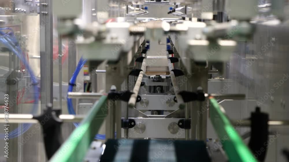 Automatic conveyor belt machine in factory. Machine for serial and multiple production Automatic conveyor belt machine in factory. Machine for serial and multiple production