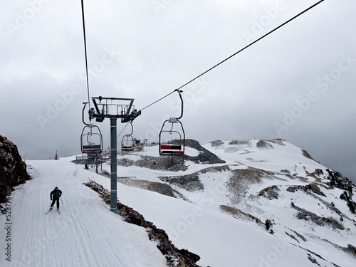 ski resort with ski lifts and skiers