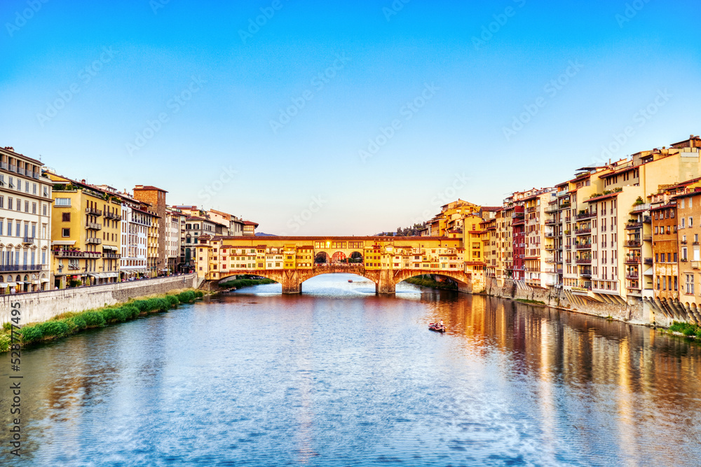 Golden Sunset over Ponte Vecchio Bridge with Reflection in Arno River, Florence