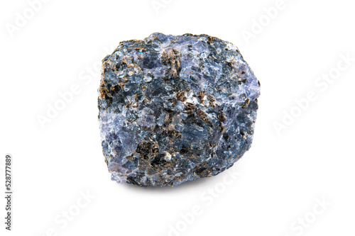 A piece of the raw mineral cordierite is bluish in color with brown and white patches photo