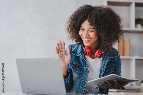 african american female students studying online using laptop online meeting