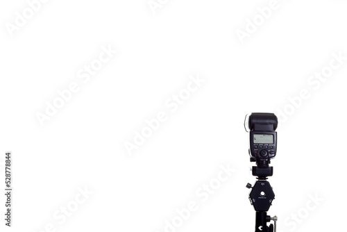 Speedlite flash on the white background and light stand photo