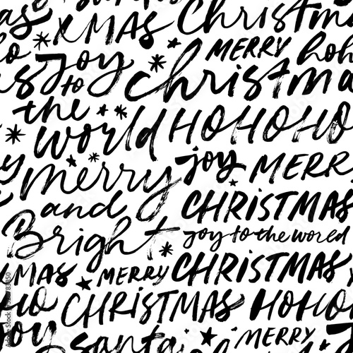Seamless pattern with Christmas lettering. Winter holiday background with handwritten text. Brush style typography. Handwritten vector ornament. Merry Christmas hand lettering calligraphy.