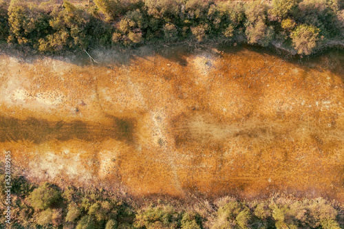Yellow sandy lake bottom at...