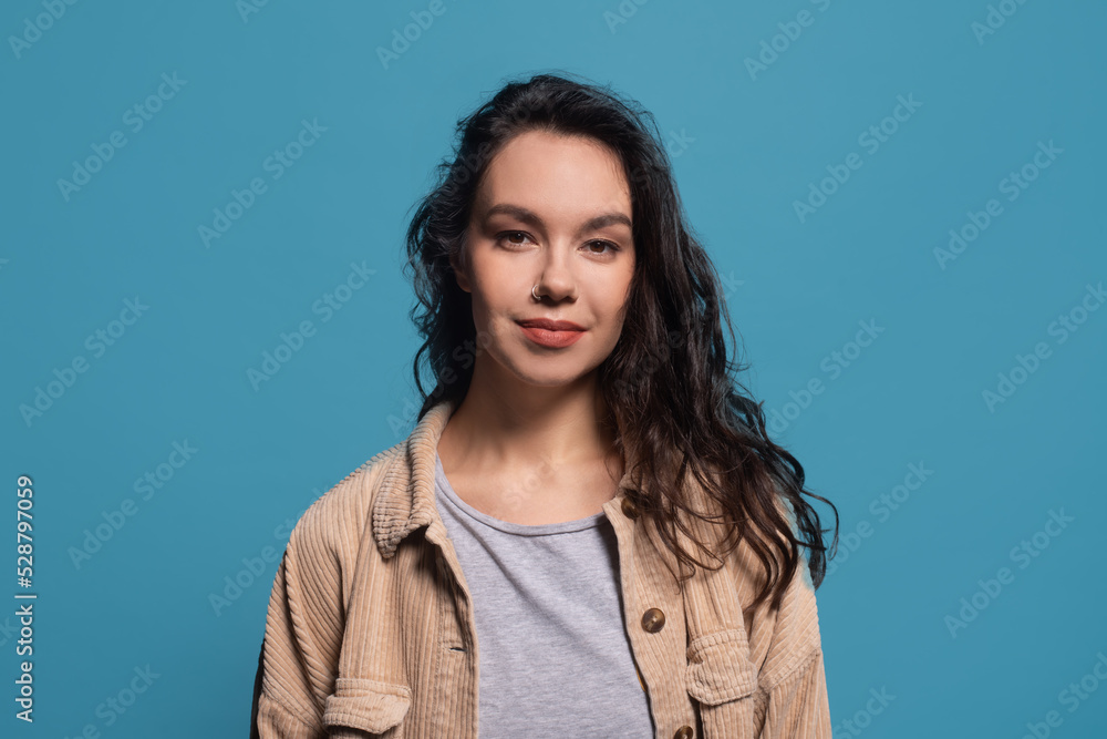 Portrait of smiling friendly pretty millennial caucasian brunette lady in casual, look at camera Portrait of smiling friendly pretty millennial caucasian brunette lady in casual, look at camera