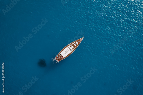 Yacht in the open ocean, drone view, top view © WhyNotTrip