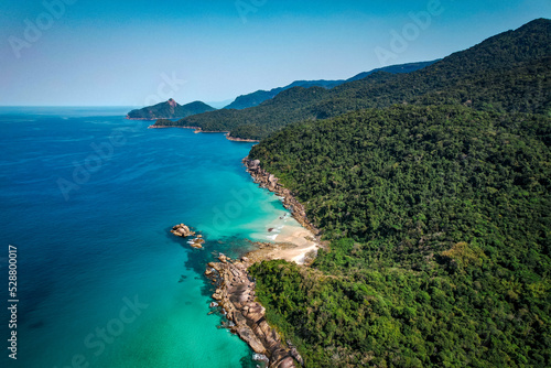 Tropical island without people, with golden sand and tropical greenery, drone view © WhyNotTrip