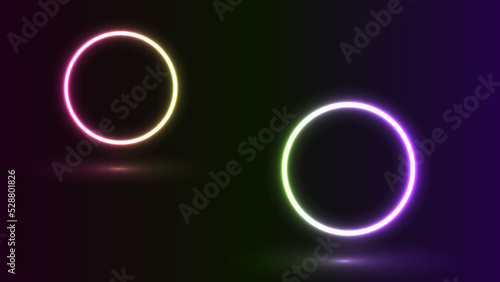 WebNeon figure on a dark background. Two rings. Circles.