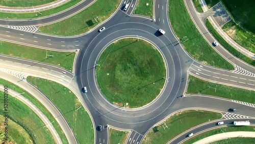 Circle traffic automobile riding ring road modern city expressway highway infrastructure aerial view
