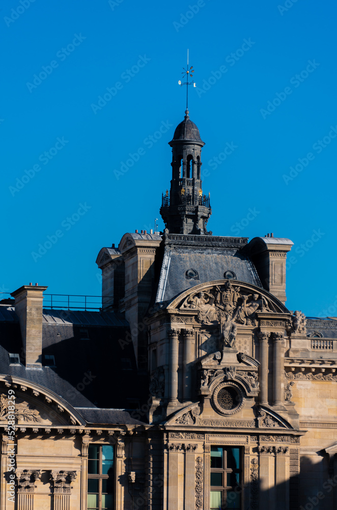 the facade of the classic european building in paris view of the museum of louvre