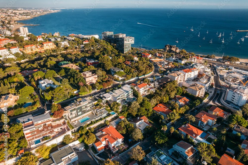 Aerial drone view of Avenida Brasil in Cascais, Portugal, one of the most  expensive street in Portugal overlooking Cascais Bay Stock Photo | Adobe  Stock