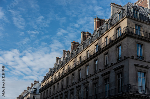 The facade of the classic european building in paris