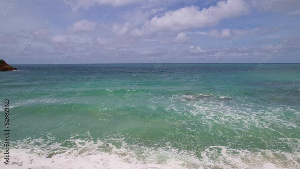 Top view tropical beach Amazing waves sea background. Crashing waves on beach sand, Beautiful sea background Top view tropical beach Amazing waves sea background. Crashing waves on beach sand, Beautiful sea background