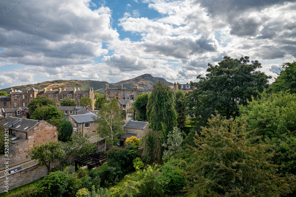 New town in Edinburgh city, view on houses, hills and trees in old part of the city, Scotland, UK