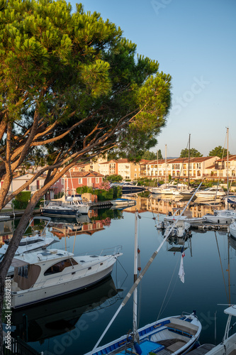 Colorful houses in Port Grimaud, village on Mediterranean sea with yacht harbour, Provence, France