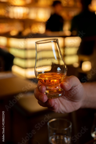 Tasting of single malt scotch whisky in whiskey bar in Edinburgh  UK