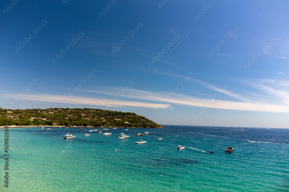 Fototapeta premium Aerial view of legendary Pampelonne beach near Saint-Tropez, summer vacation on white sandy beaches of French Riviera, France