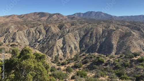Hills and mountains in the desert at Cahuilla Tewanet Vista Point at Highway 74 (Pines to Palms Hwy) at Santa Rosa and San Jacinto Mountains National Monument, CA, USA. Panorama