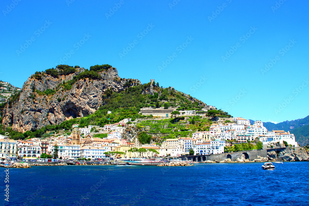 View of Amalfi. It lies at the mouth of a deep ravine, at the foot of Monte Cerreto (1315 metres, 4314 feet), surrounded by dramatic cliffs and coastal scenery