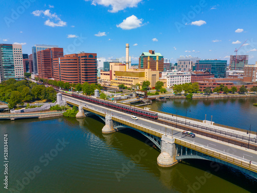 Fototapeta Cambridge Kendall Square skyline and MBTA red line train on Longfellow Bridge aerial view, Boston, Massachusetts MA, USA