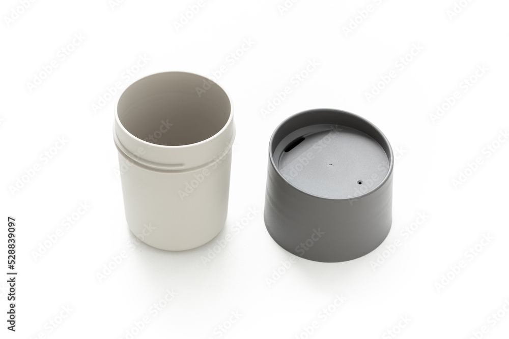Coffee cup isolated on white background. ฺBeverage container. Product design. Minimalist object. Scandinavian design. Simplicity. Daily use. Household. Plastic material. Coffee cup isolated on white background. ฺBeverage container. Product design. Minimalist object. Scandinavian design. Simplicity. Daily use. Household. Plastic material.