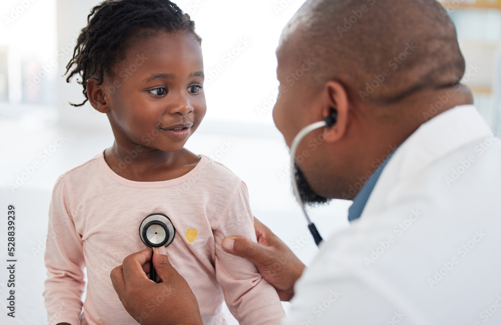 Healthcare, pediatrician and child heart doctor with a patient at