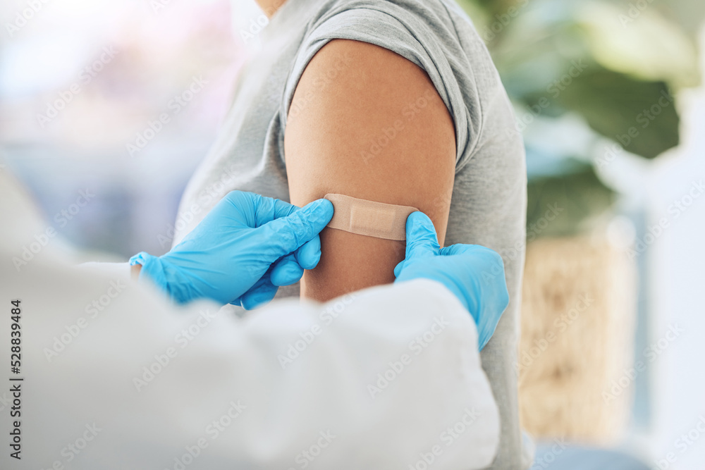 Covid virus vaccination, vaccine and doctor hands with plaster on patient arm in a medical hospital or clinic. Healthcare worker help, trust and safety flu shot antigen for protection against disease - obrazy, fototapety, plakaty 