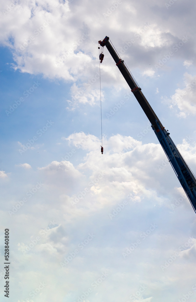concept image crane on blue background concept image crane on blue background