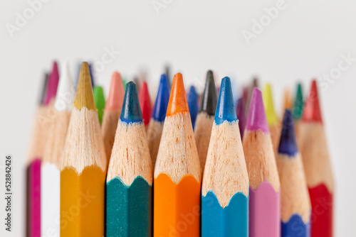 Closeup of coloring pencils isolated on white background, arts and crafts, back to school concept