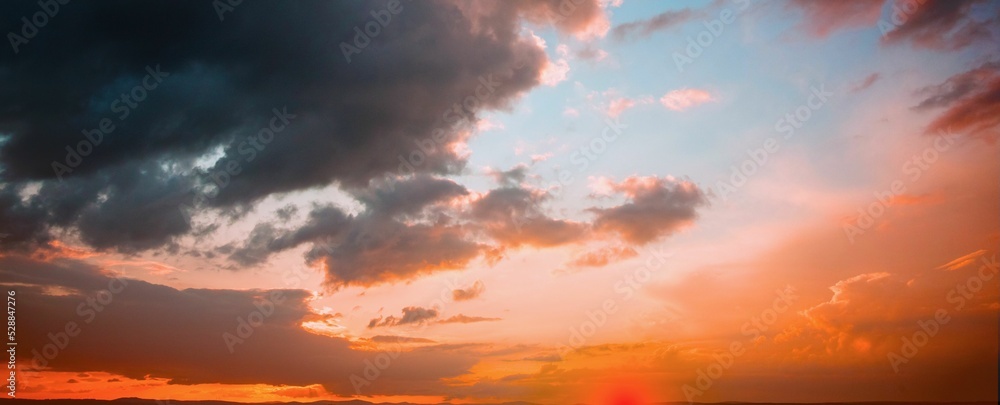 Orange and blue sky with clouds