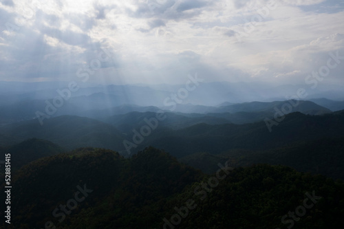 mountain ridge and clouds in rural jungle bush forest