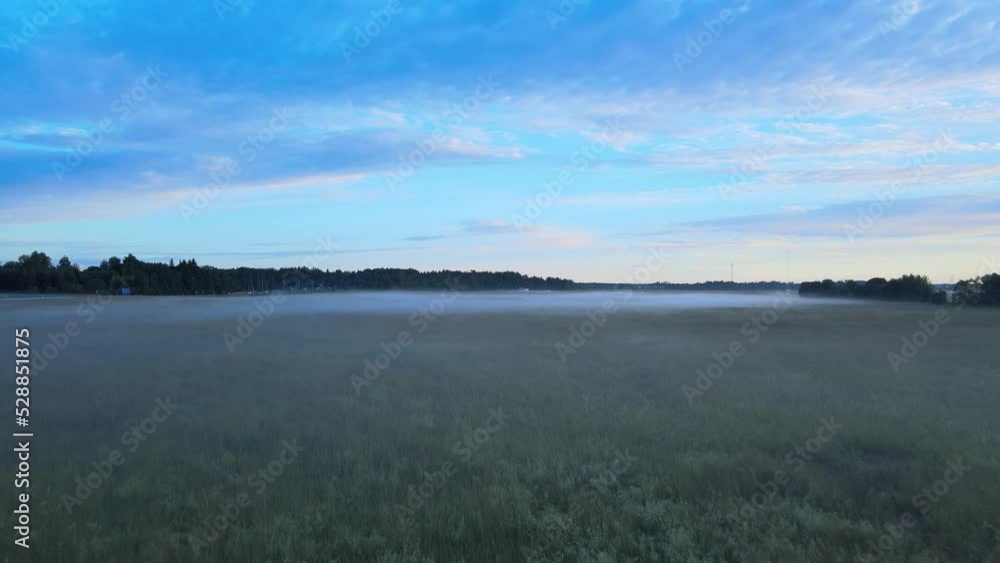 Sunset drone shot with fog on field 4K. Sunset drone shot with fog on field 4K.