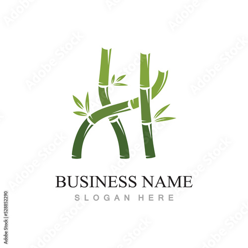 Fototapeta Naklejka Na Ścianę i Meble -  bamboo logo with green leaves vector illustration template