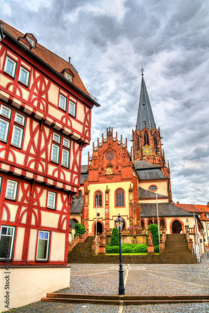 St. Peter and Alexander Church and traditional house in Aschaffenburg - Bavaria, Germany
