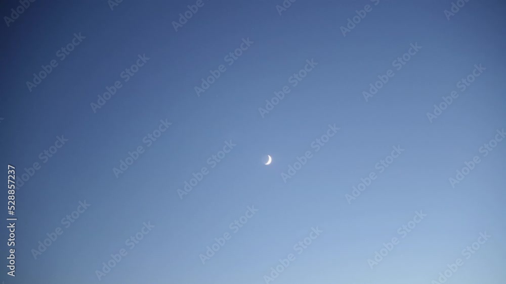 Timelapse of shining moon moving on blue sky shot. very clean movement. Timelapse of shining moon moving on blue sky shot. very clean movement.
