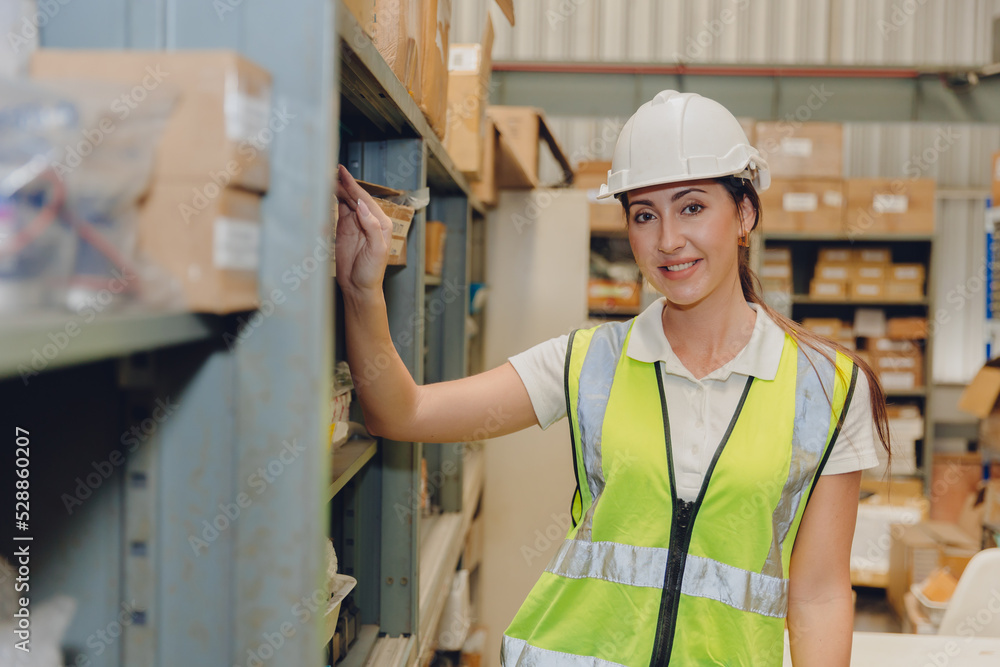 women staff worker portrait in warehouse store stock inventory women staff worker portrait in warehouse store stock inventory