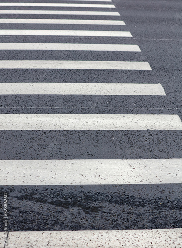 White stripes on the asphalt road.