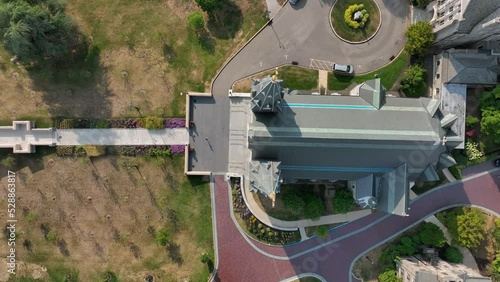 St. Thomas of Villanova University cathedral. Top down aerial of prominent building on college campus. Aerial over Lancaster Avenue. photo