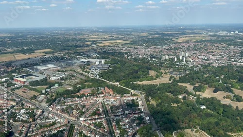 Aerial view from a jet cockpit of the western part of Brussels city, Belgium, taken at 300m high during the approach, with the Atomiun in the scene. Daylight. 4k photo