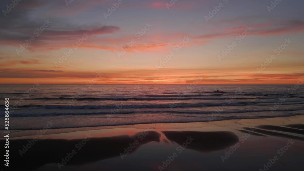 Aerial drone shot of sunset at the beach in the Oregon coast.