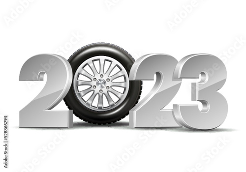 New Year numbers 2023 with car tire isolated on white background.