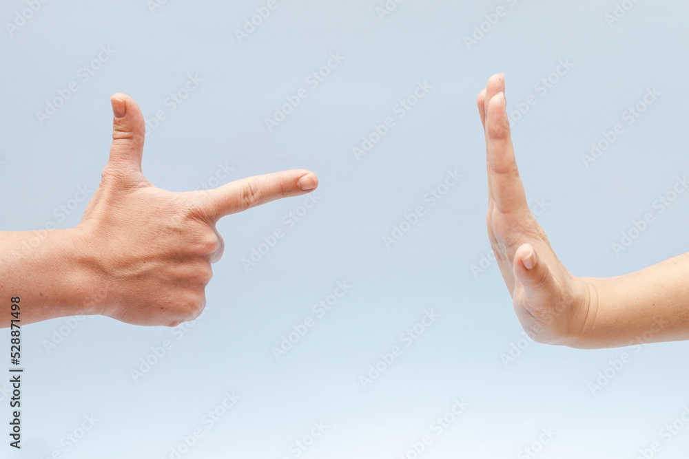 Two hands gesturing on a blue background Two hands gesturing on a blue background