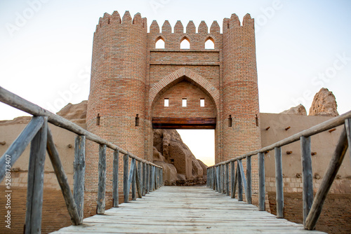 Entrance to the ancient settlement of Sauran, a bridge and a fortress, the ruins of an ancient city, medieval architecture. photo