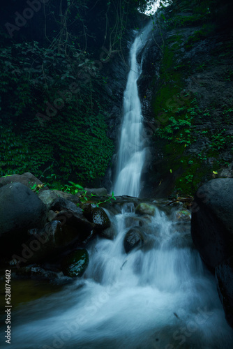 photo of a hidden waterfall, which is in Indonesia, a waterfall with a small water discharge © faris