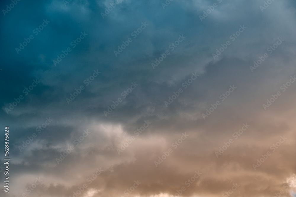 The backdrop of a summer sky before the storm. Natural background with soft clouds.