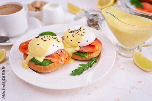 Eggs Benedict with Cream cheese and Smoked salmon on a plate