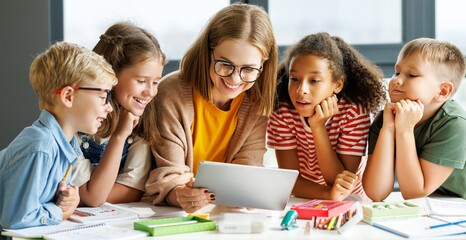 Teacher and students watching video together