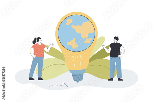 People standing near Earth globe inside light bulb. Man and woman using energy saving sustainable technology flat vector illustration. Innovation concept for banner, website design or landing web page